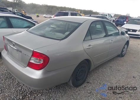 2003 Toyota Camry Le z USA, uszkodzony, nr VIN JTDBE32K830237656